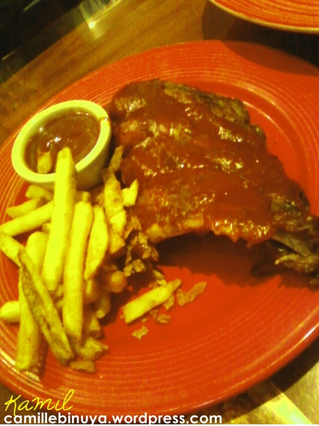 Smoked baby back ribs and fries